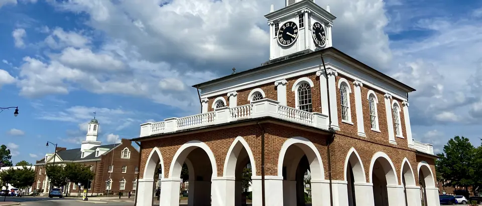 The Market House in downtown Fayetteville under a summer sky