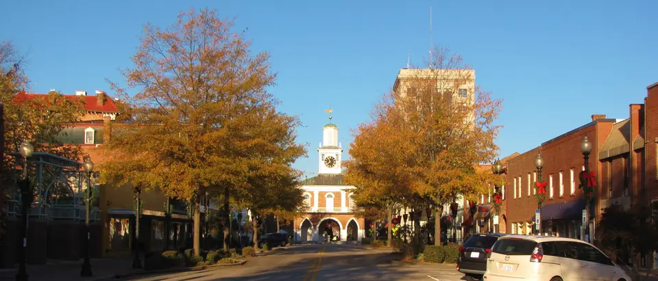 Person Street in downtown Fayetteville in the fall, the Market House at its end